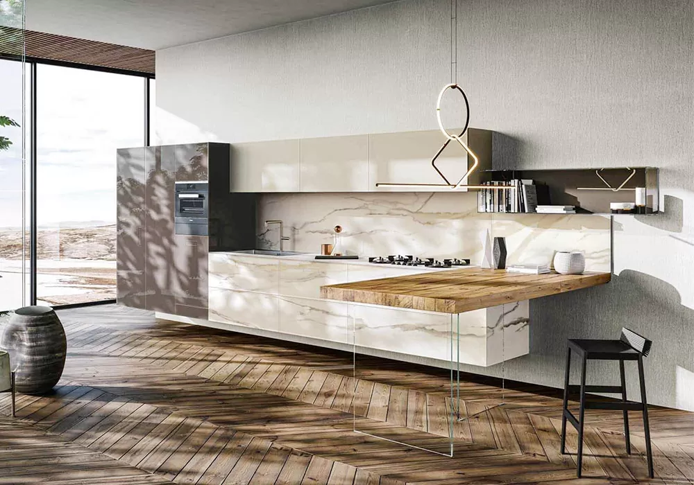 https://www.lcmobili.it/wp-content/uploads/2023/10/cucina-con-penisola-con-piani-in-marmo-36e8-marble-xglass-lago-design.webp